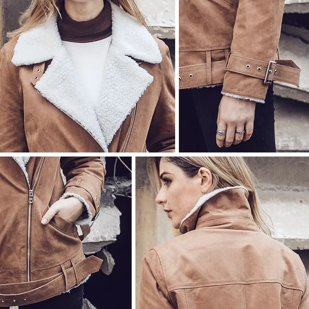 Détails du perfecto femme: col blanc doux, boucle de manche en cuir, poches zippées, et finitions de qualité pour un look mode.