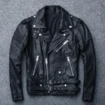 Veste perfecto en cuir noir, coupe classique style rock et esprit rebelle, avec ceinture et zips.