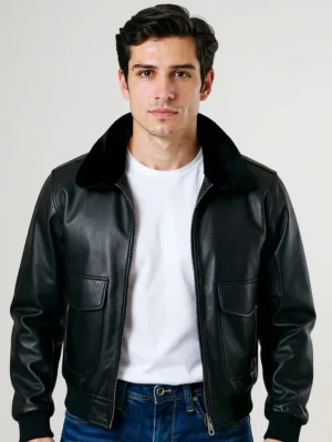 Homme portant un élégant bombardier homme luxe en cuir noir avec col en fourrure amovible, idéal pour un style urbain sophistiqué.